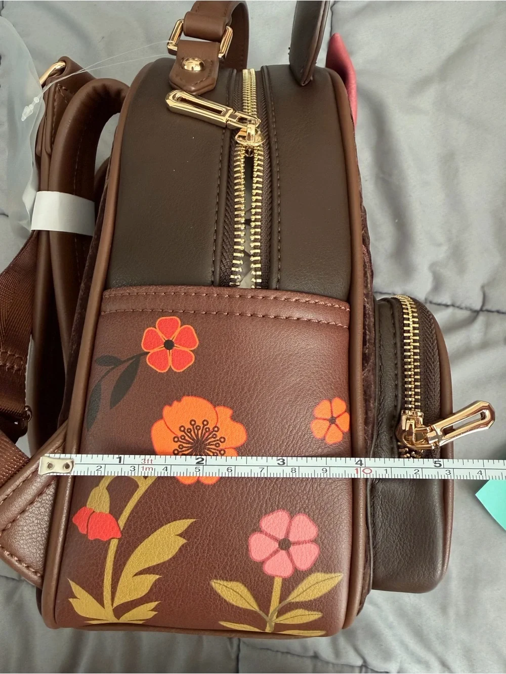 Loungefly Fall Floral Embroidered Brown Backpack with Pink Bow and applique.